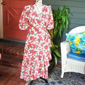Size 6 Antonio Melani floral wrap dress with ruffle detail on sleeves.
